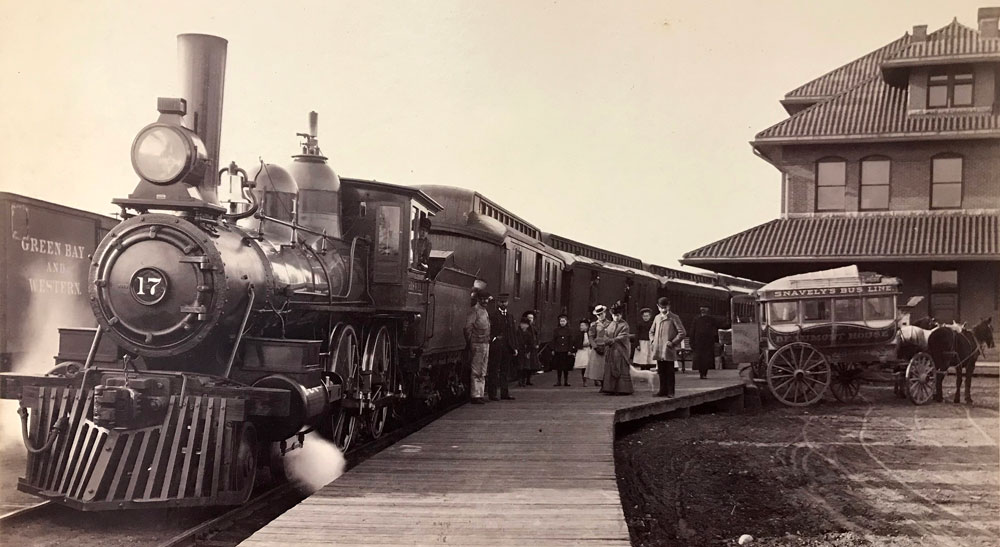 an old photo of a train and people - media and research requests