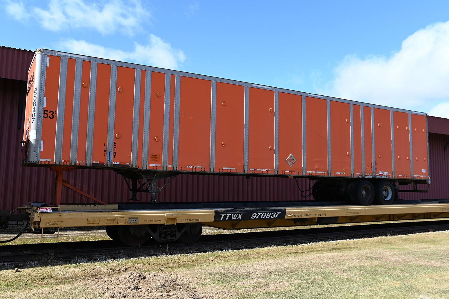TTX #970837 flatcar with Schneider National trailer