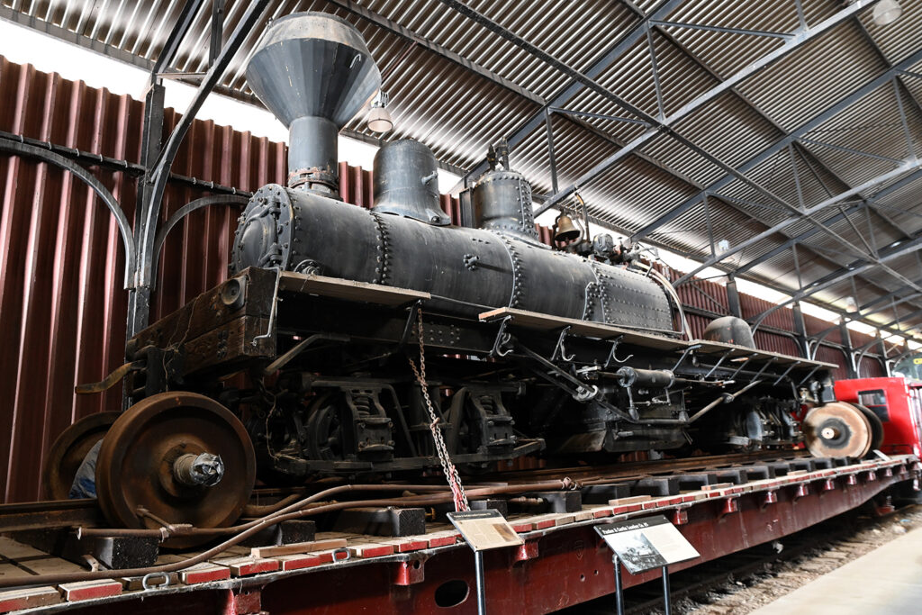 Pardee & Curtin Lumber Co. #5 locomotive on flatcar