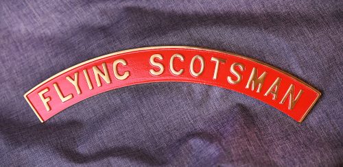 ABOVE: This souvenir name plate, made in England, celebrated the Flying Scotman's visit to the United States in 1969.