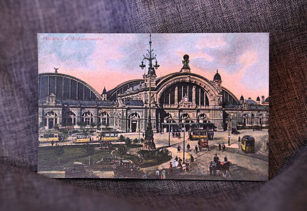 ABOVE: This undated postcard shows a colored drawing of the train station in Frankfurt, Germany.